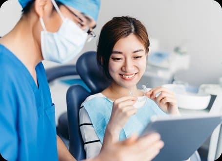 A patient smiling in the dental chair during an appointment